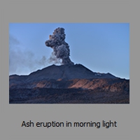 Ash eruption in morning light